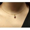 Cruz de oro de 18K con rubíes