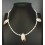 Collar de perlas y conchas