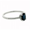 Anillo de oro blanco con diamante y zafiro