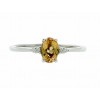 Sortija de oro blanco (18K) con diamante y topacio