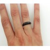 Sortija de oro blanco con zirconitas negras